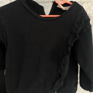 Black sweatshirt with ruffle detail